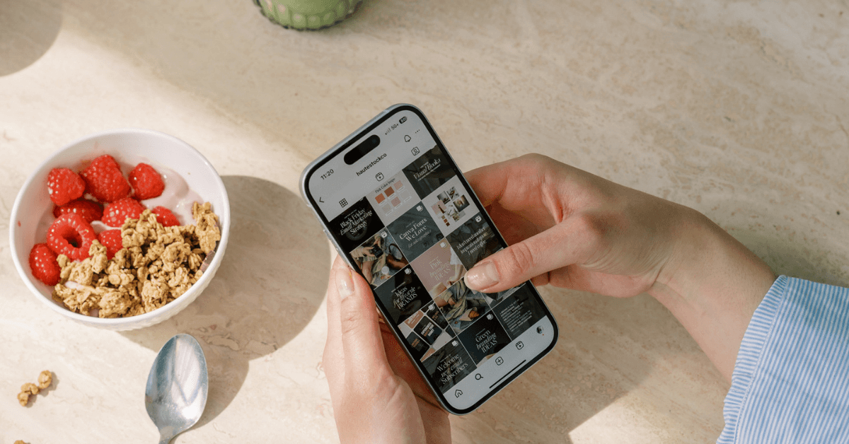 a woman's hands holding her cell phone scrolling on Instagram stories